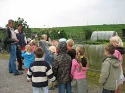 Wij kopen groenten bij de groenteman